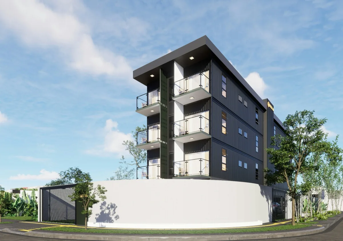 Modern apartment building exterior with balconies and clean architectural lines