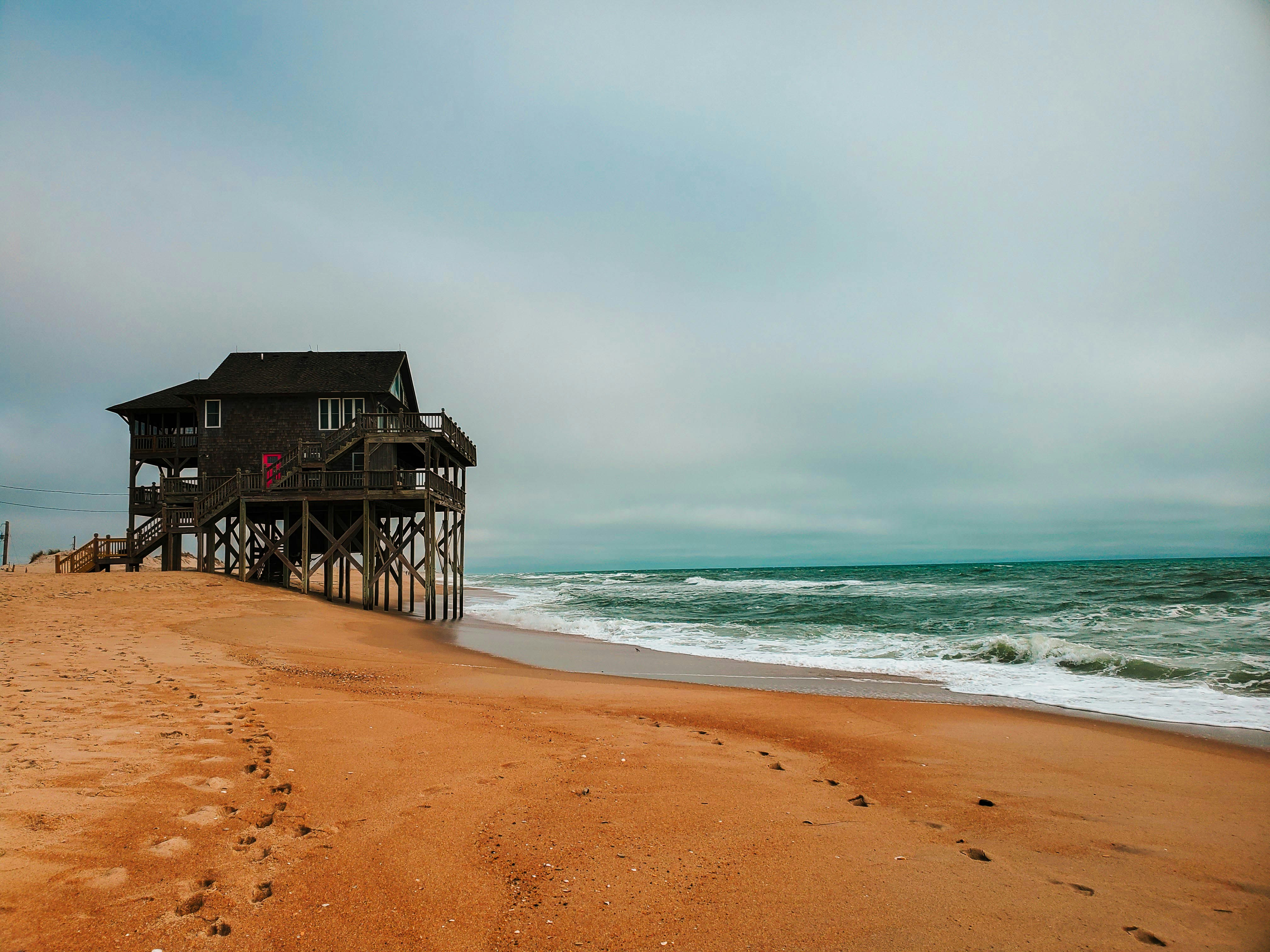 Outer Banks beach at sunset with dunes and sea oats