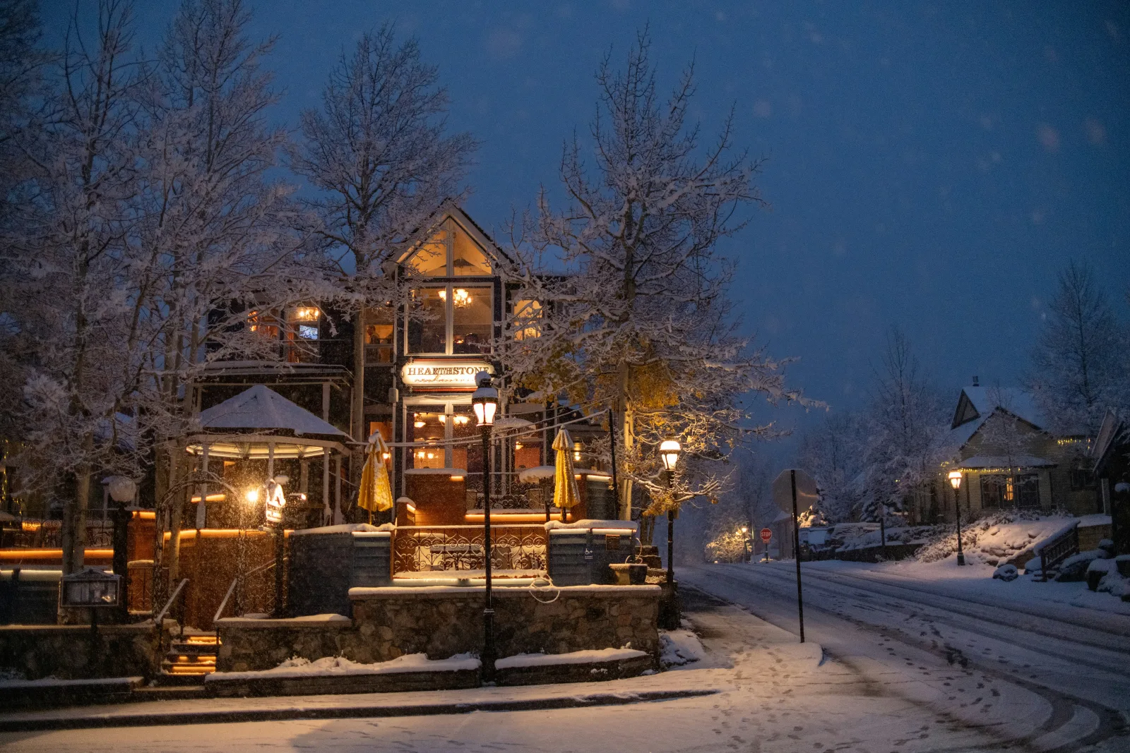 Aspen slopeside ski chalet exterior with snow-covered mountain backdrop