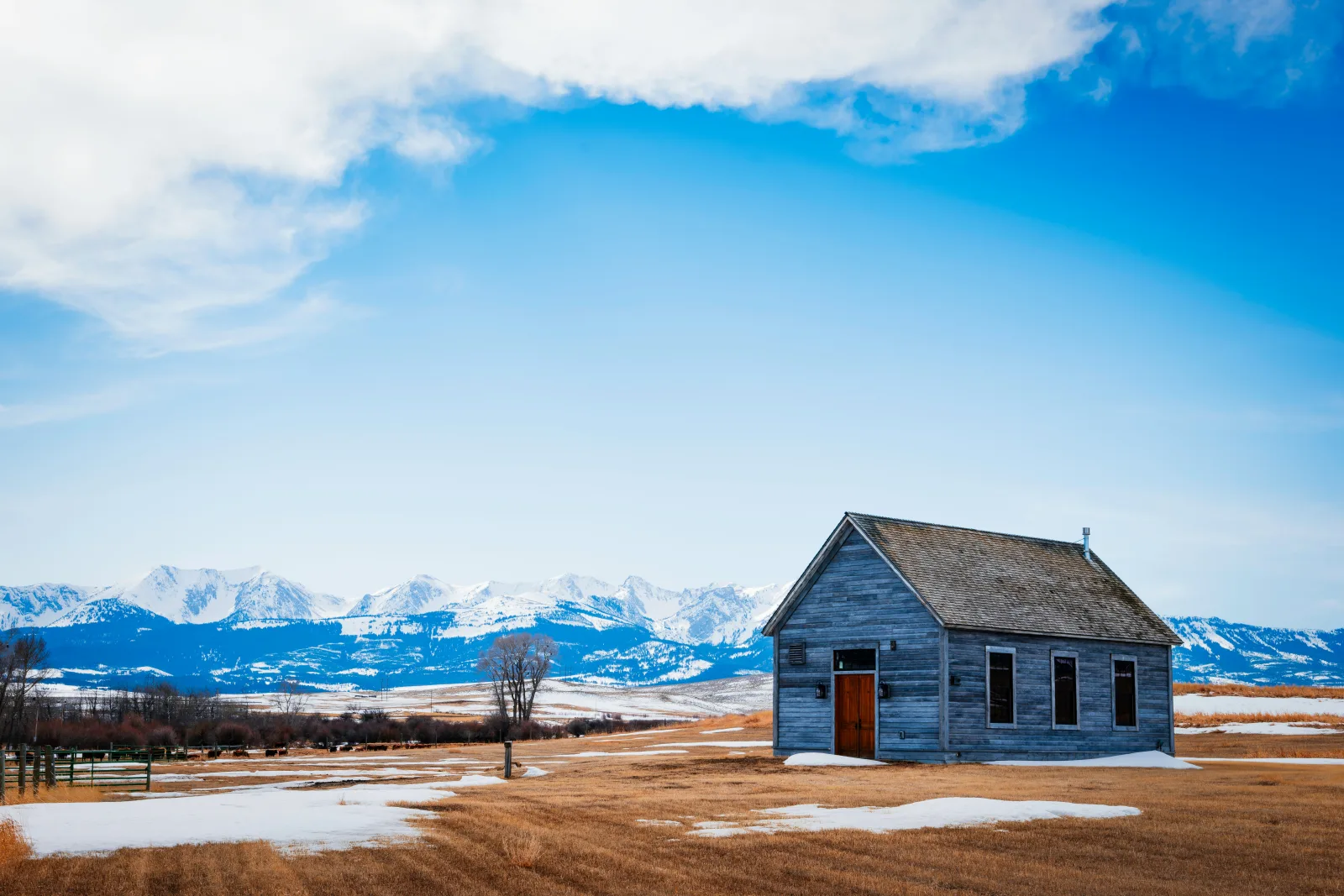 Bozeman Big Sky luxury mountain cabin with hot tub deck and snow