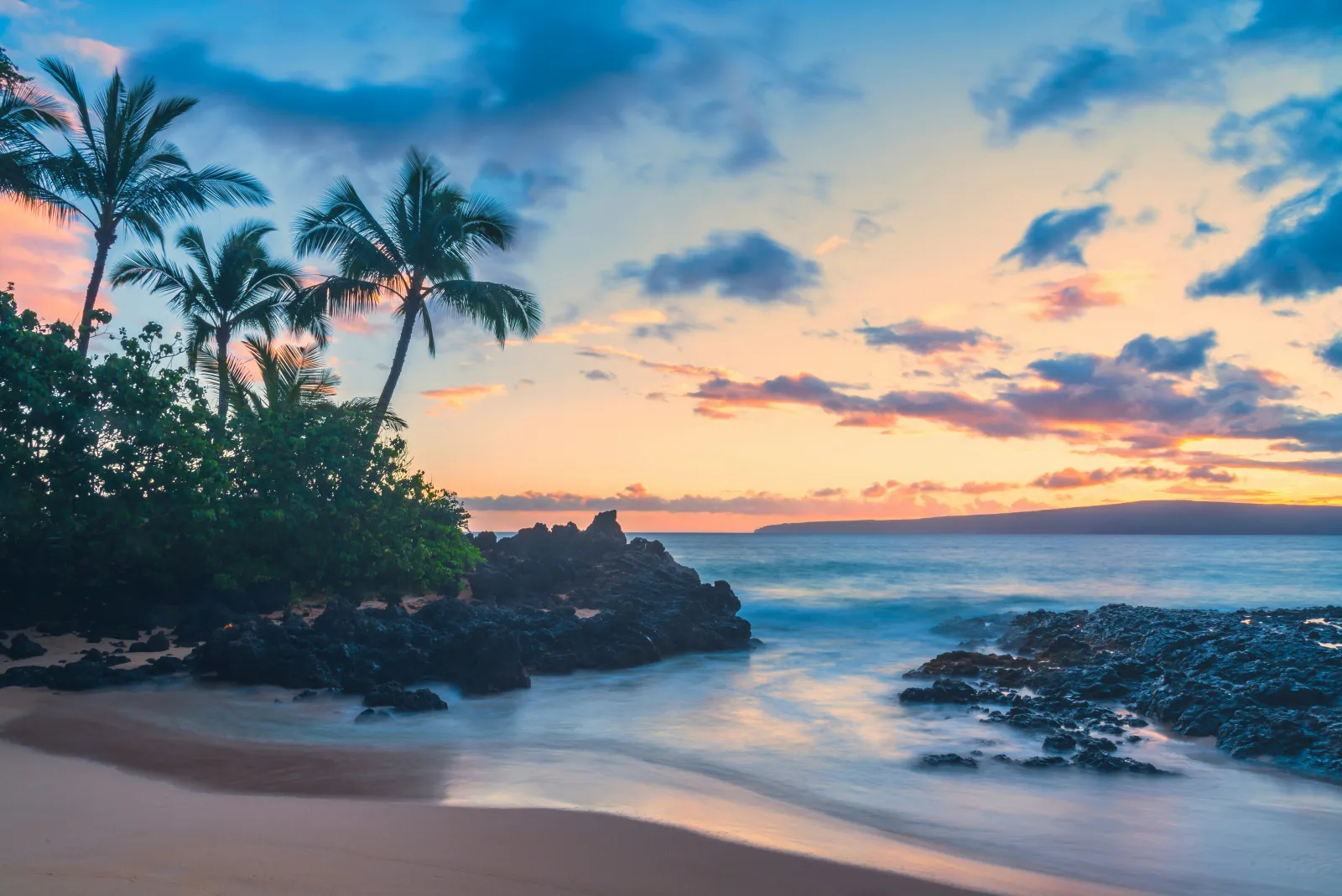 Maui Wailea oceanfront condo lanai with view of Mākena coastline