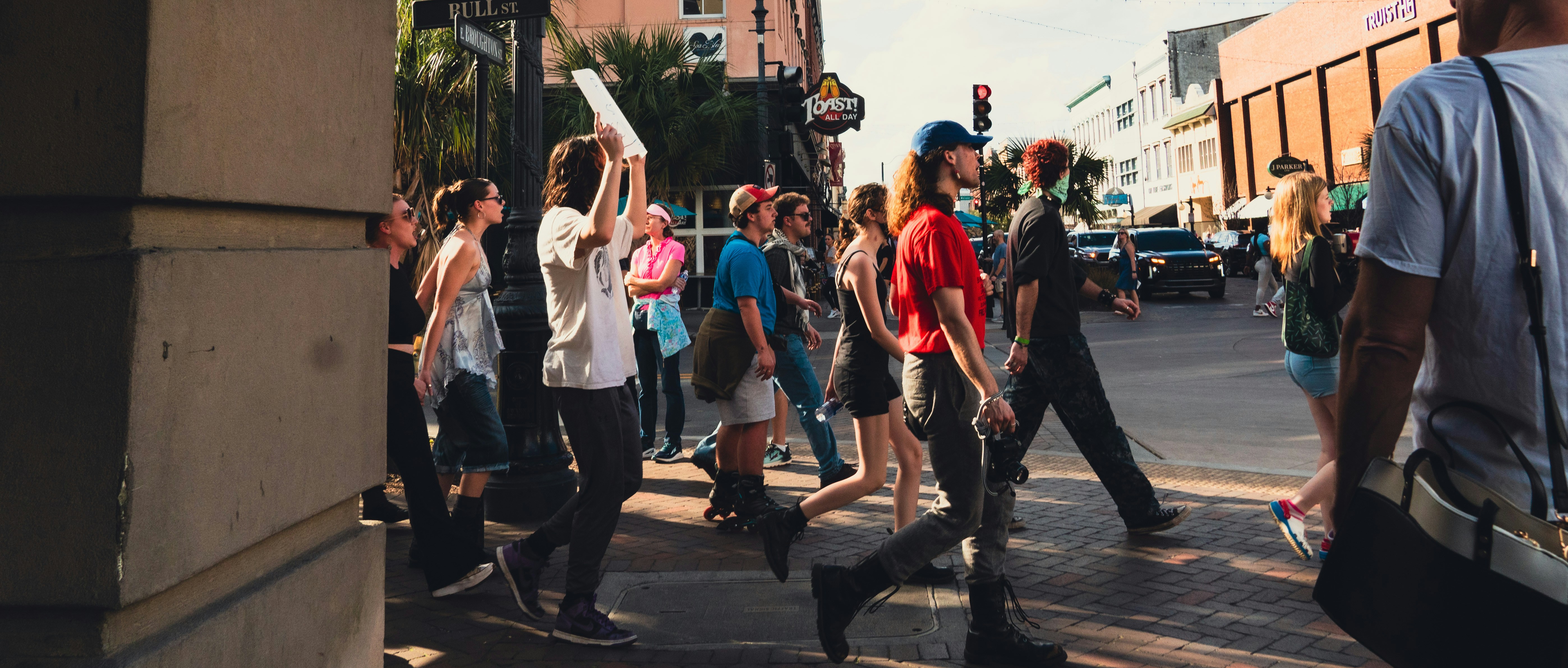 Historic Savannah architecture with wrought iron balconies and oak trees